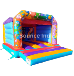 A lively indoor playground filled with colorful bounce houses and inflatable slides, offering endless fun for kids at Bouncy Hut